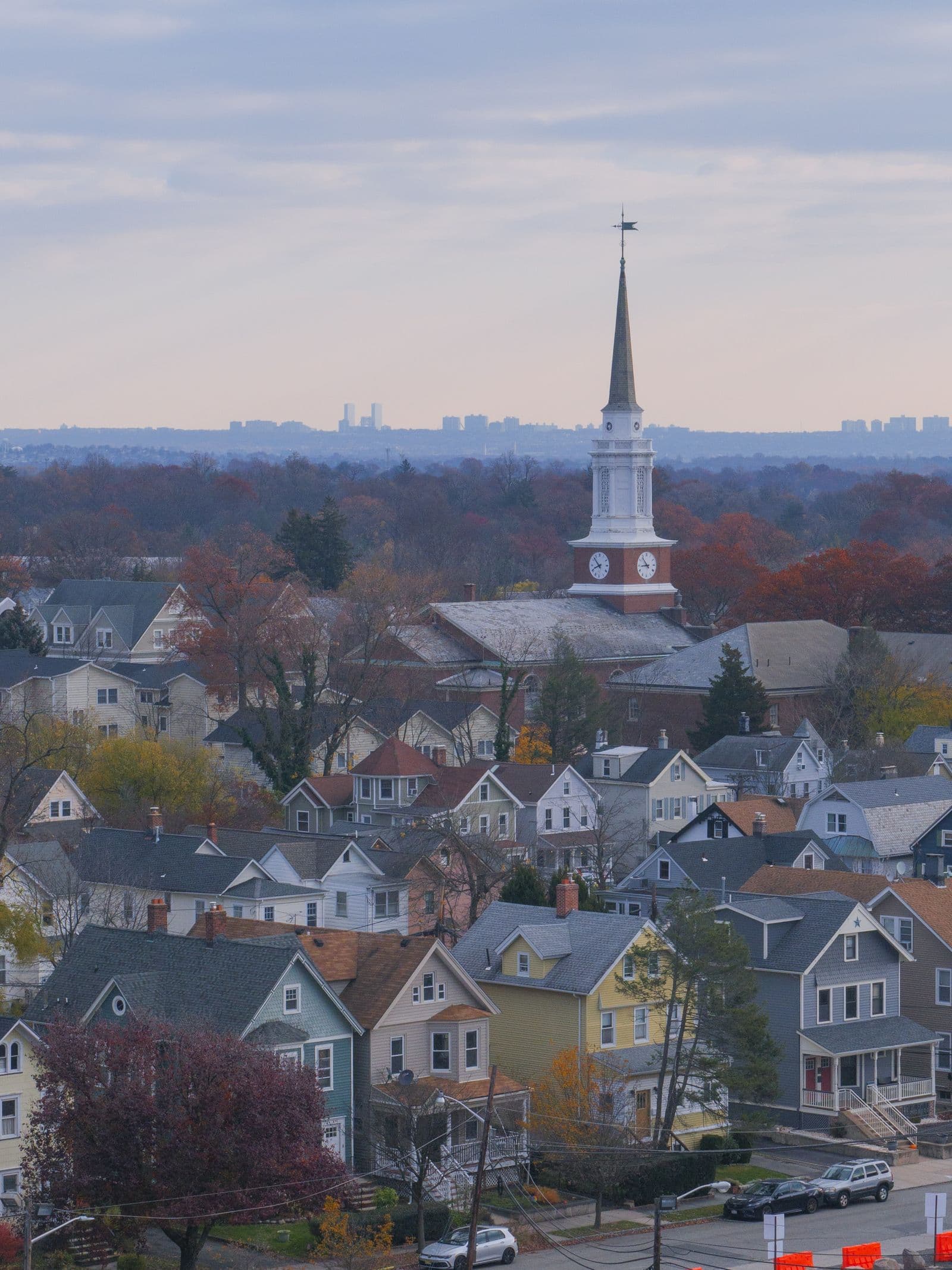 Aerial view of homes and a church steeple in Montclair, New Jersey
